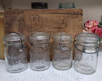 4 Vintage IMPERFECT Clear Atlas E-Z Seal Pint Sized Jars with Scratch and Dent Clear Glass Regular or Standard Star Pattern Glass Lids