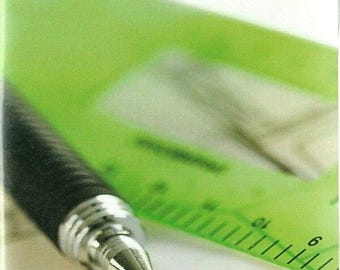 May include: A black mechanical pencil with a silver tip positioned over a green plastic ruler and a white paper surface with the text AutoSketch 10 printed at the top. The ruler features visible metric markings and numerical increments.