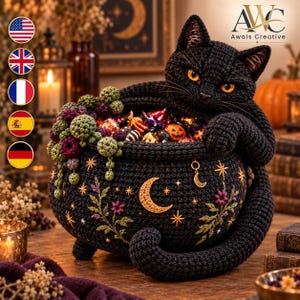 May include: A black crocheted cat resting its paws on a black crocheted cauldron. The cauldron features embroidered gold crescent moons, stars, and floral vines. A cluster of green and purple crocheted berries hangs over the side. The cauldron is filled with assorted colorful candies.