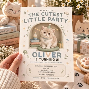 May include: A birthday invitation card featuring a fluffy kitten wearing a party hat, sitting on a cushion inside an arched alcove. The text reads: The Cutest Little Party, Oliver is Turning 2, Saturday, October 24, 2026, 2:00 PM, 125 Maple Lane.