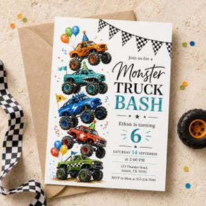 Könnte beinhalten: Eine weiße Einladungskarte mit einem Stapel aus fünf bunten Monstertrucks, Partyhüten und Luftballons. Der Text lautet Join us for a Monster Truck Bash, Ethan is turning 6, Saturday 14 September at 2:00 PM, 123 Thunder Road, Austin, TX 78701, RSVP to Mom at 555-234-7890.