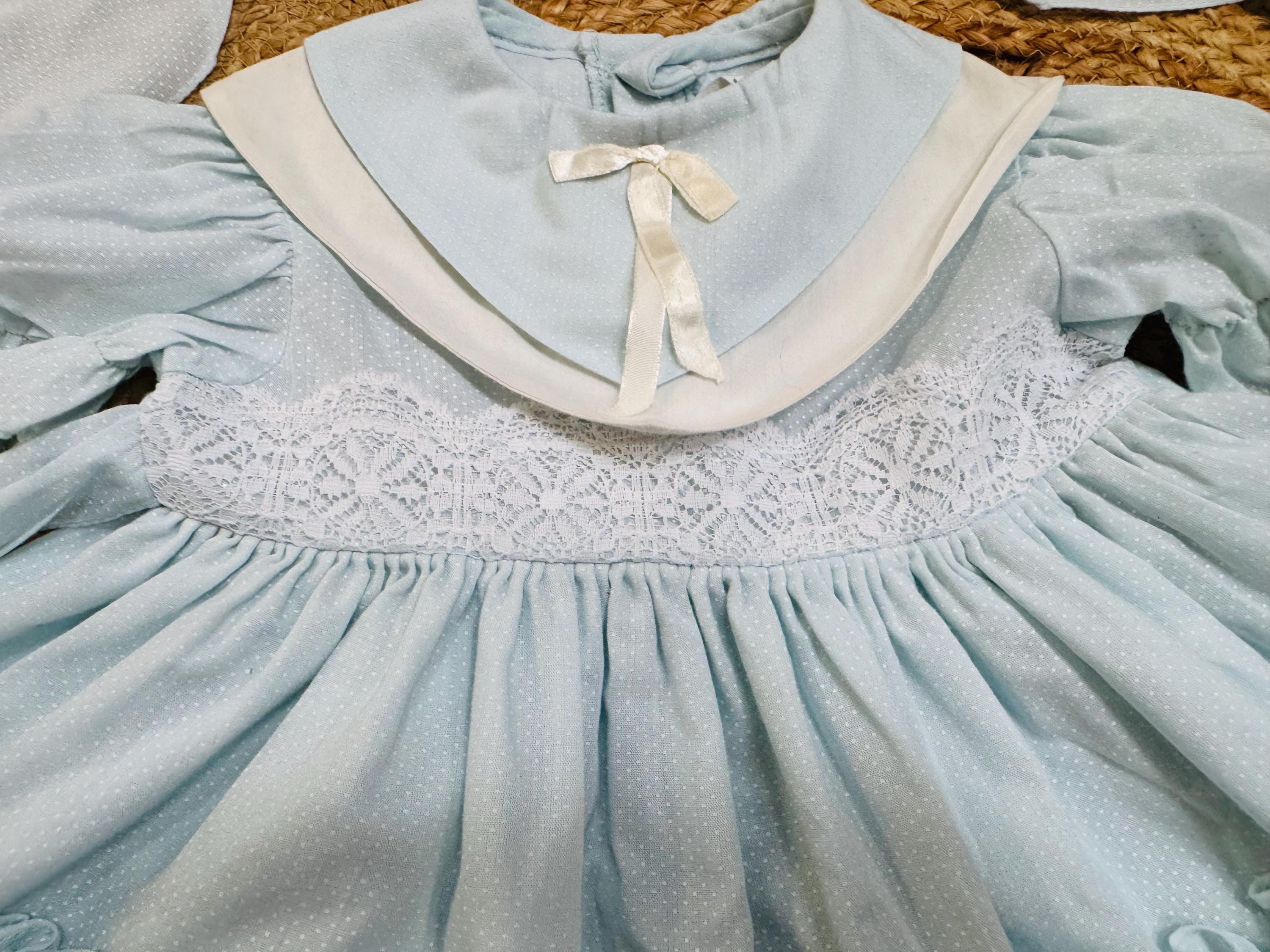 Martha's Miniatures Twirl Dress Sz 2-3T | Powder Blue Dotted Swiss | Lace Pinafore and Hidden Jingle Bell | Heirloom Boutique Martha's Miniatures Twirl Dress Sz 2-3T | Powder Blue Dotted Swiss | Lace Pinafore and Hidden Jingle Bell | Heirloom Boutique