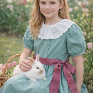 May include: A set of three ceramic mugs with a speckled, matte finish. The mugs are in shades of cream, light gray, and dark gray. Each mug has a simple, minimalist design and a rounded handle.