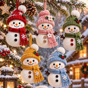 May include: Five crocheted snowman ornaments hanging from a snowy pine tree. Each snowman wears a different coloured knit hat and scarf, including red, pink, green, yellow, and blue. They feature white bodies, orange noses, and dark buttons.