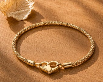 Pandora Armband mit goldenem Herzverschluss, luxuriöses Armband mit gewebter Kette, eleganter Goldschmuck, ideales Geschenk zum Jahrestag oder zur Hochzeit für Sie