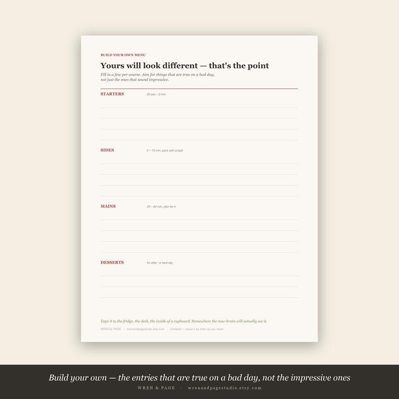 Puede incluir: Un planificador de men&uacute; de papel color crema titulado Build Your Own Menu con el texto Yours will look different &mdash; that's the point. Incluye secciones para Starters, Sides, Mains y Desserts con l&iacute;neas en blanco para escribir.