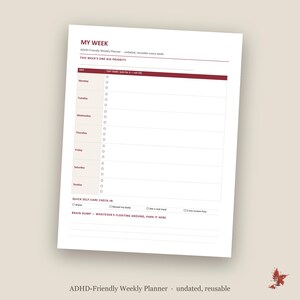May include: A white weekly planner sheet with dark red text and lines. The header reads MY WEEK and ADHD-Friendly Weekly Planner. It includes sections for daily tasks, a top priority, a quick self-care check-in, and a brain dump section at the bottom.