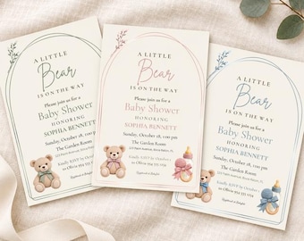 May include: Three rectangular baby shower invitation cards featuring an arched frame design. Each card displays the text A LITTLE BEAR IS ON THE WAY, BABY SHOWER, and HONORING SOPHIA BENNETT, accompanied by a teddy bear and a baby bottle illustration.