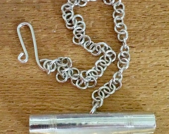 Silver Needle Case with Scribed Bands on a Chain