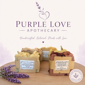 May include: Three bars of handcrafted soap with brown paper labels, featuring text including ingredients and weight. The soap bars are arranged with dried lavender sprigs. The brand name Purple Love Apothecary is displayed above the soap.