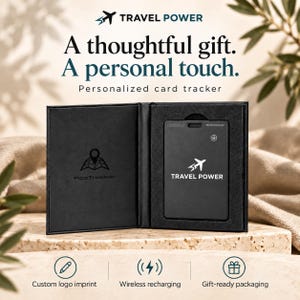 May include: A black rectangular card tracker with the text TRAVEL POWER and an airplane icon, housed in a black open presentation box. The box interior features the AceTracker logo. Text includes A thoughtful gift. A personal touch. Personalized card tracker.