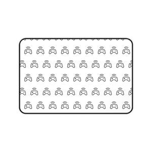 May include: A rectangular desk mat featuring a repeating pattern of black line art video game controller icons on a white background. The mat has rounded corners and a solid black border framing the entire gaming-themed surface design.