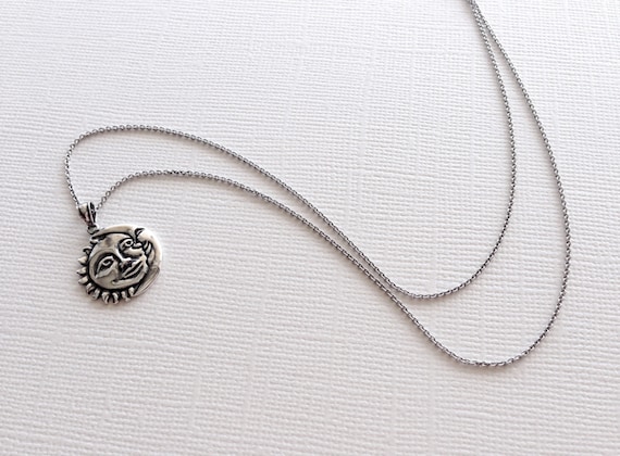 Elegante pendente sole-luna in argento 925 con ambra da Mar Baltico