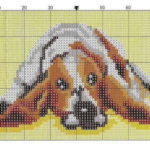 May include: A cross-stitch design depicting a dog's face, using brown, white, and black threads against a yellow backdrop. The dog's eyes, nose, and ears are detailed in the pattern. The image is a close-up of the dog's face.