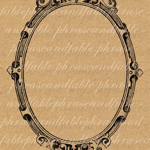 May include: A black and white vintage oval frame with ornate scrollwork details. The frame is isolated on a brown background.