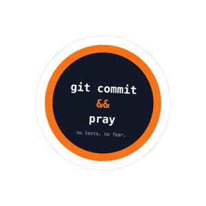 May include: A circular sticker with a dark navy blue center and a bright orange border. The text reads git commit && pray in white and orange, with the smaller white text no tests. no fear. centered at the bottom of the navy blue circle.