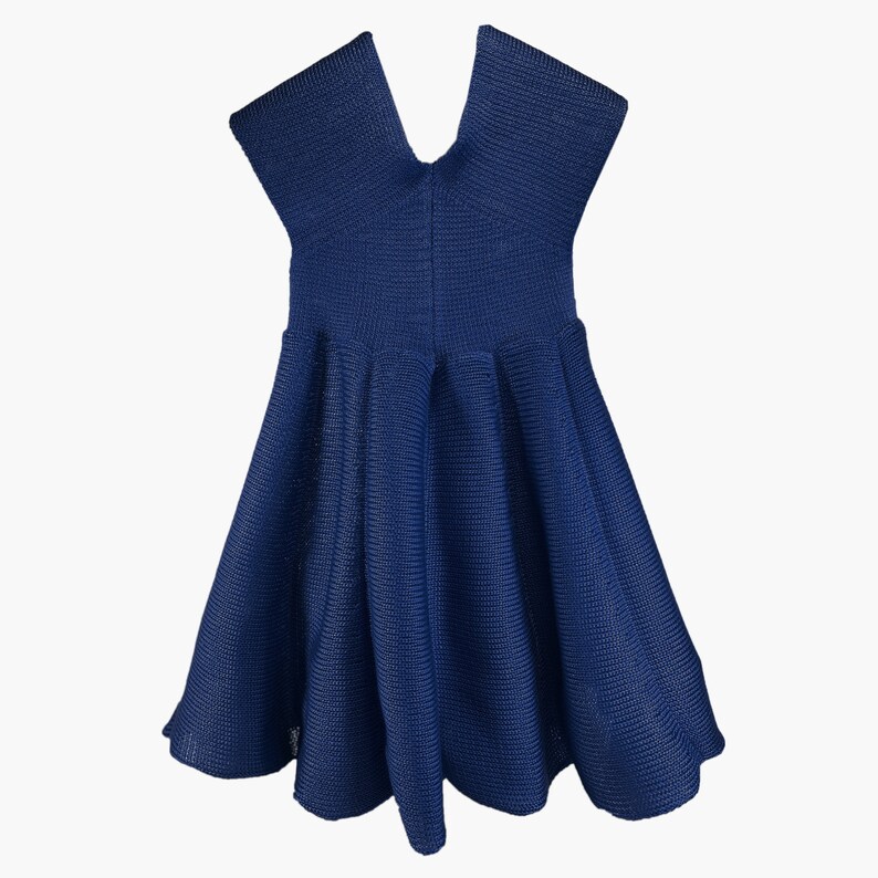 May include: A navy blue knit dress with a v-neck and a flared skirt.