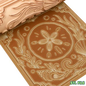 May include: A light brown textured rolling pin with a raised pattern of a sand dollar, seashells, and seaweed, shown pressing into a matching brown clay surface that displays the same embossed marine design. The text STL FILE is visible.