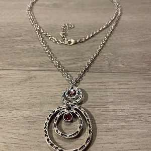 Vintage Silver Open Circle Statement Necklace, 36-38” Long Hammered Concentric Ring Pendant with Ruby Red Rhinestone, Boho Chic Layering