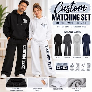 May include: A matching set consisting of a hoodie and wide-leg pants in black and white. The hoodie features a drawstring hood and front pouch pocket. The pants display the text CUSTOM TEXT. The set is available in black, charcoal, gray, and navy.