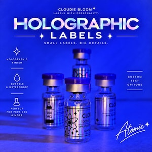 May include: Four small glass vials with purple caps and silver holographic labels. The labels feature text including CLOUDIE BLOOM, HOLOGRAPHIC LABELS, SMALL LABELS. BIG DETAILS., 100 MG, 99% PURITY, and Atomic. The design includes icons of a flask and an atom.