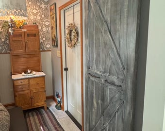 Custom Solid Wood Bi-Fold Barn Door