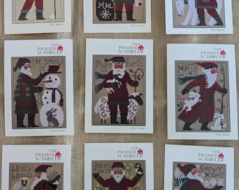 Schooler Santas Counted Cross Stitch Charts by The Prairie Schooler - 2000, 2002, 2011, 2012, & 2017 thru 2025