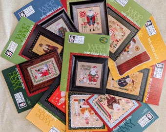 Wee Santa 2025 to 2010 Heart in Hand Cross Stitch Patterns - Choice