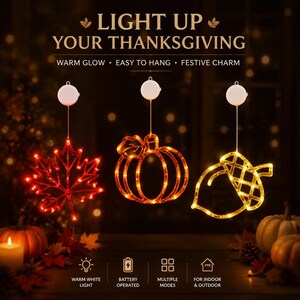 Op de afbeelding: Drie hangende LED-decoraties in de vorm van een rood esdoornblad, een oranje pompoen en een gele eikel. Elk stuk heeft een wit batterijcompartiment. Tekst: LIGHT UP YOUR THANKSGIVING, WARM GLOW, EASY TO HANG, FESTIVE CHARM, WARM WHITE LIGHT, BATTERY OPERATED, MULTIPLE MODES, FOR INDOOR & OUTDOOR.