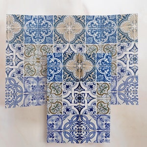 May include: A set of blue and white patterned tiles with a floral design. The tiles are arranged in a grid pattern and have a vintage look.