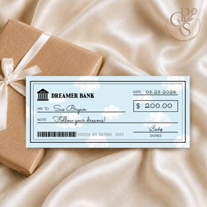May include: A light blue cheque from Dreamer Bank with a white cloud pattern. The cheque is dated 03-23-2026, made out to Sue Bryan for $200.00, with the note Follow your dreams! and a signature by Becky. It features a bank icon and a barcode.