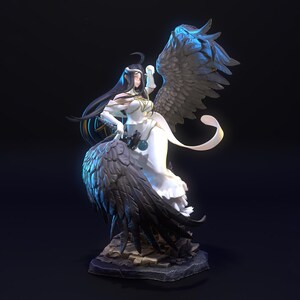May include: A detailed figurine of a character with long black hair, wearing a white dress with gold accents. The figure features large, dark, feathered wings, a sword held at the waist, and stands on a rocky base with blue lighting effects.