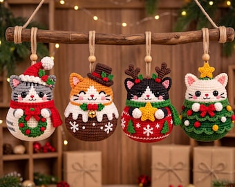 May include: Four crocheted cat ornaments hanging from a wooden branch. The first cat wears a Santa hat and scarf with a wreath. The second wears a top hat and brown sweater. The third has reindeer antlers and a red sweater. The fourth wears a tree costume.