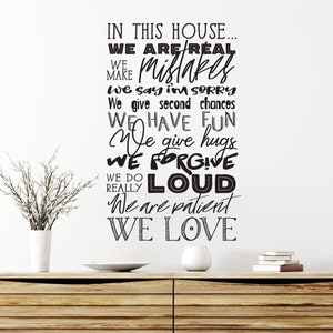May include: Black and white wall decal with the text "In this house... We are real mistakes. We say I'm sorry. We give second chances. We have fun. We give hugs. We forgive. We do really loud. We are patient. We love."