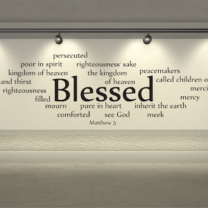 May include: A black and white word cloud with the word "Blessed" in the center. The word cloud includes words like "poor in spirit", "kingdom of heaven", "righteousness", "peacemakers", "children of God", "merciful", "mercy", "inherit the earth", "meek", and "Matthew 5".