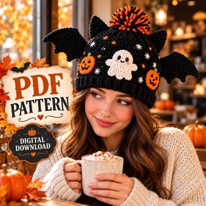 May include: A black crocheted beanie featuring a white ghost, orange pumpkins, and black bat wings on the sides, topped with an orange and black pom-pom. The image includes text that reads PDF PATTERN and DIGITAL DOWNLOAD.