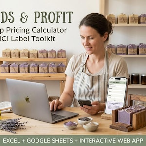 May include: A digital soap pricing calculator and INCI label toolkit featuring a laptop, a smartphone displaying an app interface, a wooden soap cutter with a purple soap loaf, lavender sprigs, and small bowls of powder on a wooden table.