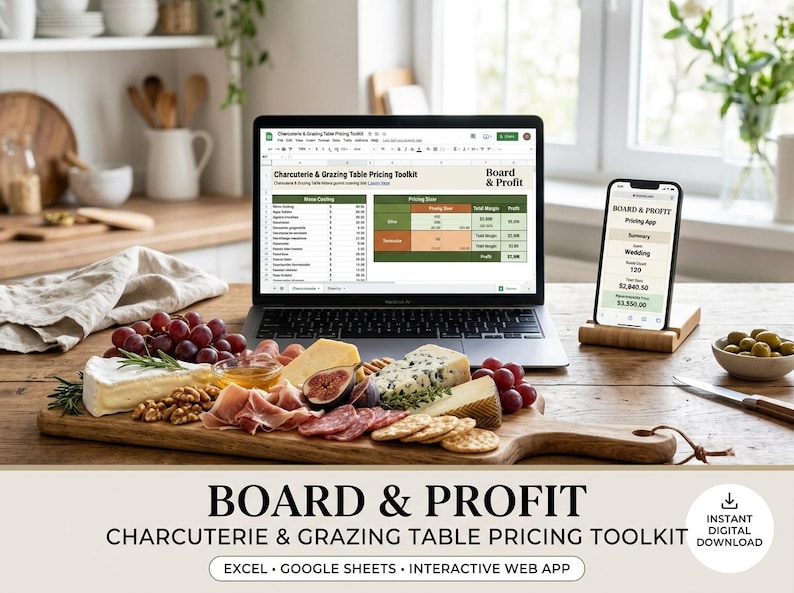 May include: A laptop and a smartphone displaying the Board & Profit Charcuterie & Grazing Table Pricing Toolkit software, positioned behind a wooden serving board filled with cheese, grapes, figs, nuts, and cured meats on a kitchen table.