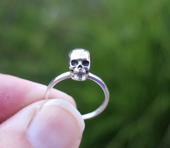 Real silver skull best sale rings