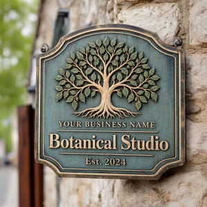 Könnte beinhalten: Ein rechteckiges Schild mit türkisfarbenem Hintergrund und einem goldfarbenen Relief eines Baumes mit Wurzeln. Der Text lautet: YOUR BUSINESS NAME, Botanical Studio und Est. 2024. Das Schild hat einen dekorativen Goldrand und Metallbeschläge.