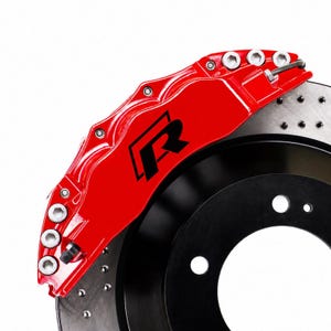 May include: A high-performance automotive brake system featuring a bright red brake caliper with a black letter R logo. The assembly includes a metallic silver drilled brake rotor with a black center hub, secured by multiple silver hex bolts.
