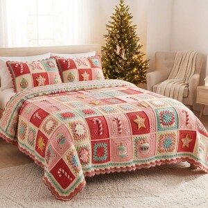 May include: A crochet bedspread and two matching pillow shams featuring a patchwork design of red, pink, cream, and teal squares. The textile is decorated with three-dimensional appliqu&eacute;s of candy canes, stars, and ornaments in festive colors.