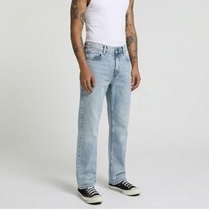May include: Light blue denim jeans with a classic straight-leg cut, featuring a high-waisted design, a button fly closure, and traditional five-pocket styling. The fabric has a light wash finish with subtle fading throughout the legs.