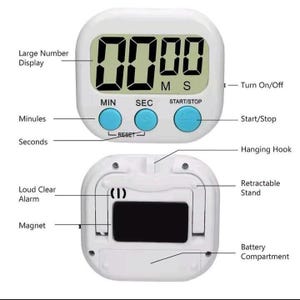 May include: A white digital kitchen timer with a large number display, three blue buttons labeled MIN, SEC, and START/STOP, a hanging hook, a retractable stand, a magnet, and a battery compartment, featuring text labels for all functional components.