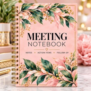 May include: A spiral-bound meeting notebook with a soft pink cover featuring watercolor-style green and pink leaves with gold accents. The text reads MEETING NOTEBOOK, NOTES, ACTION ITEMS, and FOLLOW-UP with a small gold heart icon.