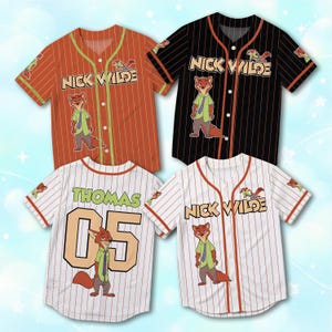 May include: Four short-sleeved button-down baseball jerseys featuring Nick Wilde from Zootopia. One is orange with white stripes, one is black with white stripes, and two are white with orange stripes. One white jersey displays the name THOMAS and 05.