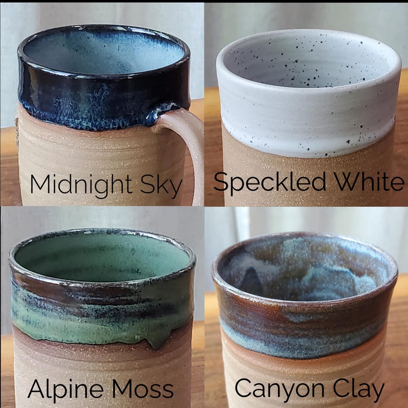 May include: Four handmade ceramic mugs with unique glaze finishes. The mugs are labeled "Midnight Sky" with a dark blue rim, "Speckled White", "Alpine Moss" with green and brown tones, and "Canyon Clay" with brown and blue hues.