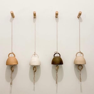 handmade ceramic bells in 12 neutral colors and 3 sizes handcrafted bells for home decor pottery chimes indoor bell outdoor bell wall art