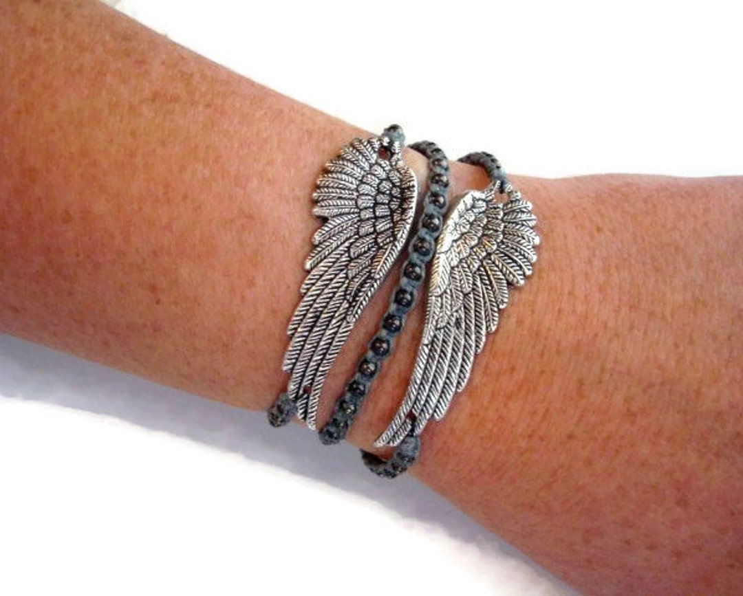Angel wing bracelet meaning Clearance