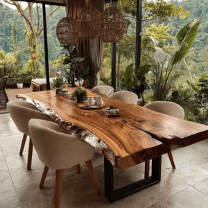 May include: A large live-edge wooden dining table with a natural grain pattern and a thick slab top, supported by black metal U-shaped legs. Four cream-coloured textured fabric chairs with wooden legs are positioned around the table.